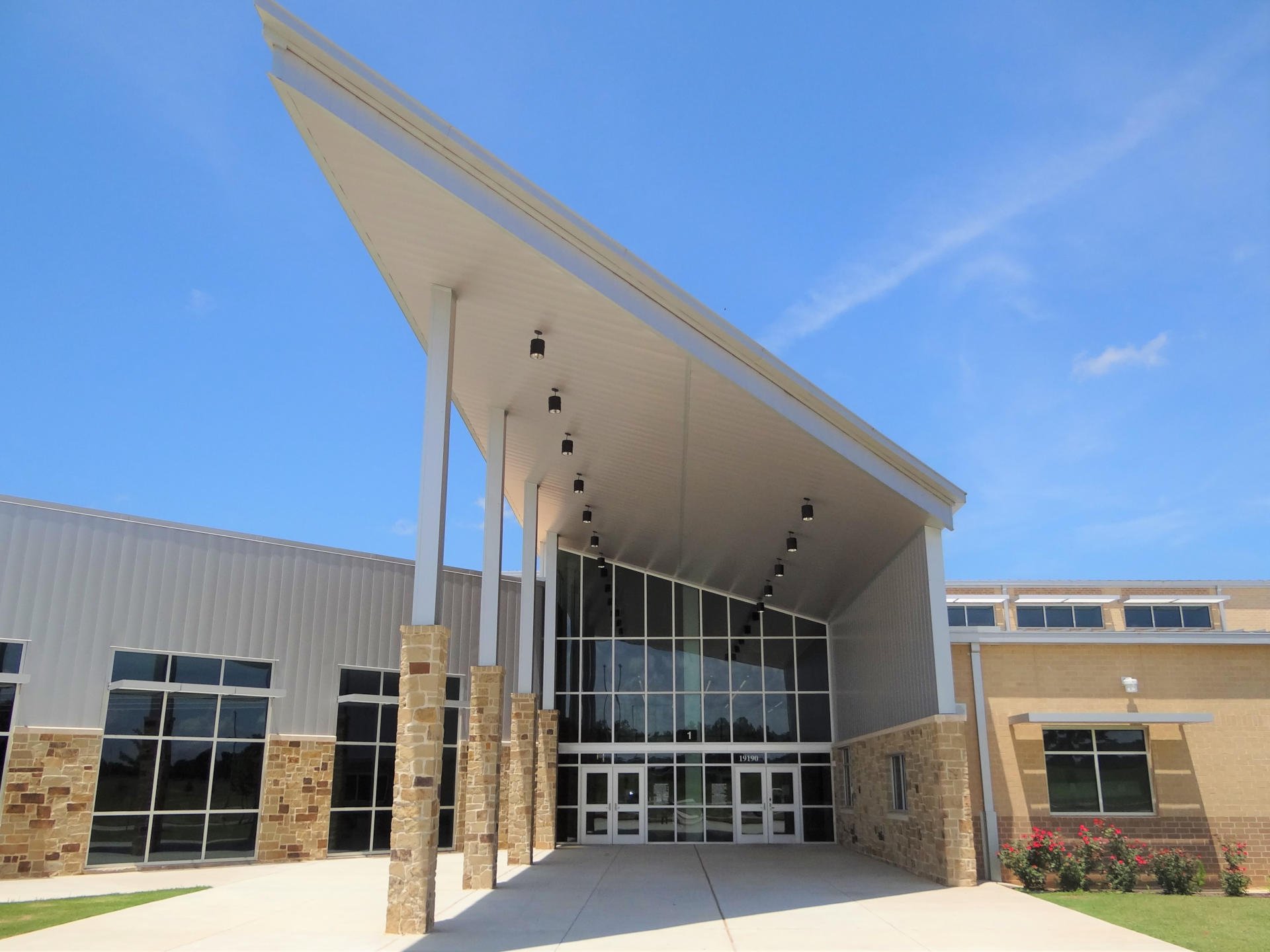Montgomery ISD – Oak Hills Junior High School & Keenan Elementary SchoolMontgomery ISD’s Oak Hills Middle School & Keenan Elementary School were built concurrently. The 214,182 SF, two-story middle school and 96,000 SF, single story elementary school are located on a common site. The 64 acre site is located on sloping terrain which required vertical modifications of existing elevations by 18’ to properly situate the building structures and site appurtenances. In addition to the building structures, the scope of work includes a football field, running track, field events, practice athletic fields, concession stands, site paving and detention pond. The building construction elements include a structurally suspended slab, Class A steel framing, masonry load bearing walls, exterior masonry veneer and standing seem metal roofing.Back to Portfolio
